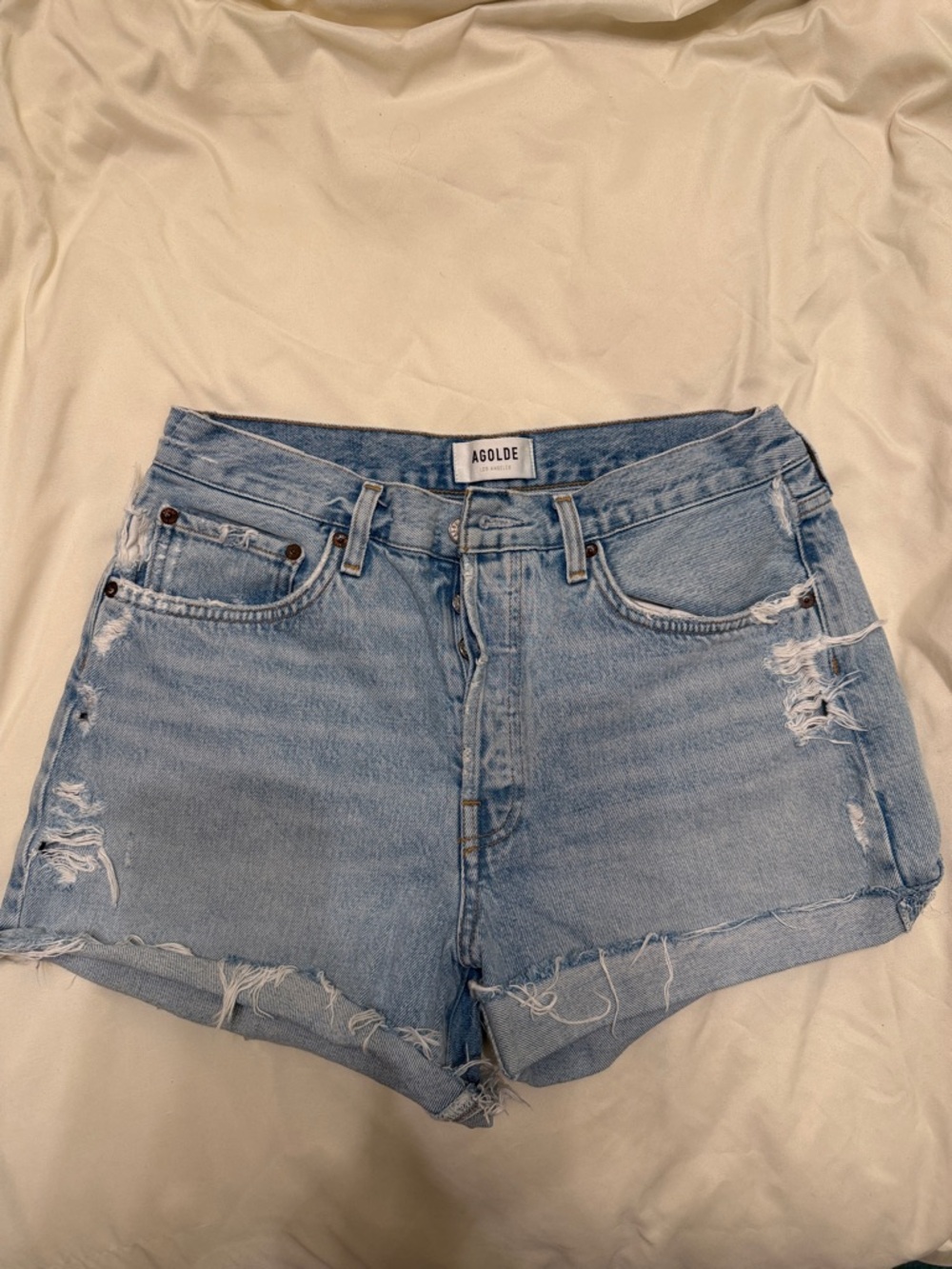 Agolde Light Wash Distressed Denim Cutoff Shorts